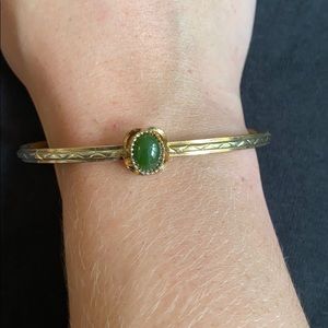 Gold bracelet with gemstone